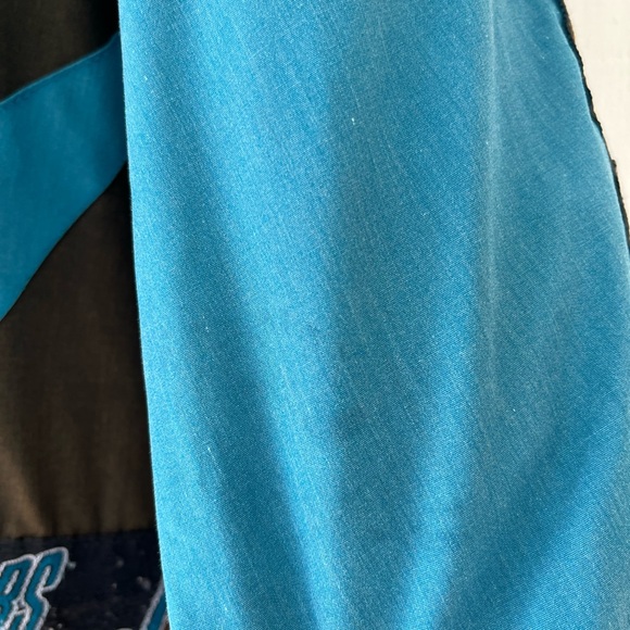 Vintage Pro Player Banned Logo Jacksonville Jaguars Puffer Jacket